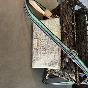 Gold snake skin Consuela crossbody purse. Multi color adjustable strap.